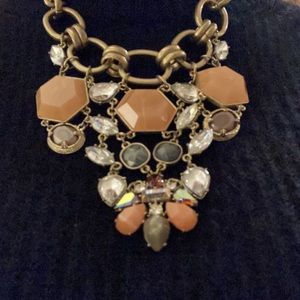 Anthropologie sparkly bib necklace; adjustable length. Lays flat beautifully